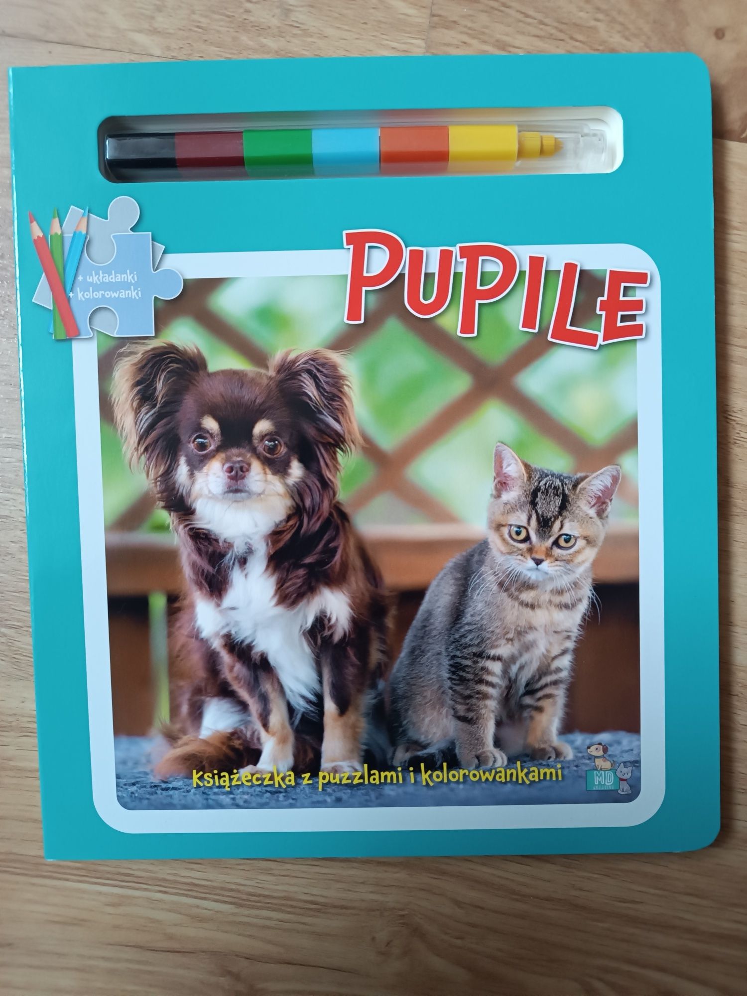 Książeczka z puzzlami i kolorowankami pupile twarda oprawa i strony NO