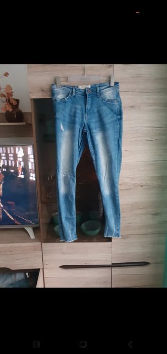 Spodnie damskie jeans Reserved 36
