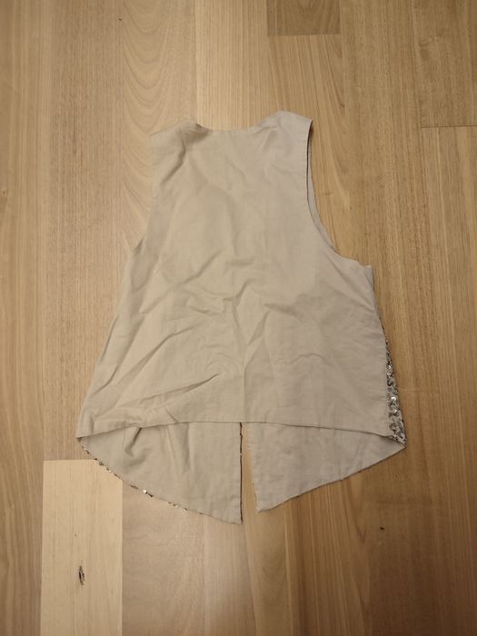 Colete com lantejoulas da Mayoral Tam 18