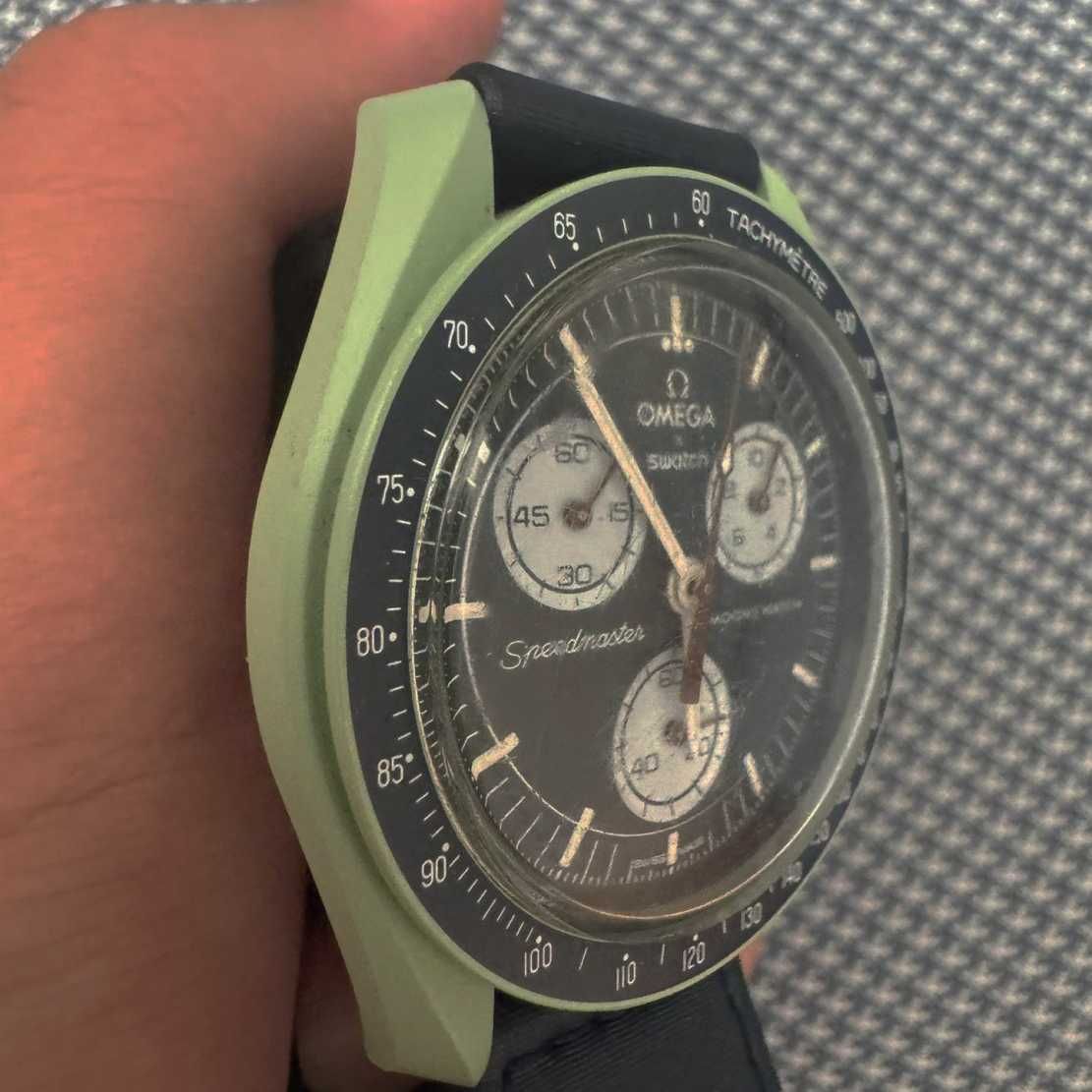 Zegarek Omega Swatch Ziemia SO33G100 - second-hand, ładny