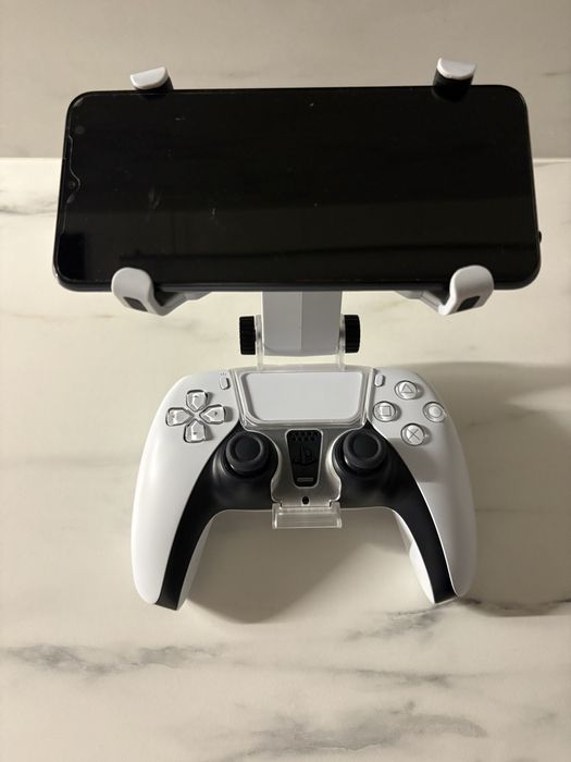 Uchwyt dualsense ps5 konsola clip jak portal do telefonu jak nowy