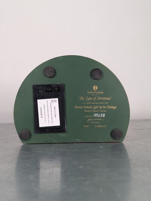 Świąteczna figurka Światło Bożego Narodzenia św Mikołaj Thomas Kinkade