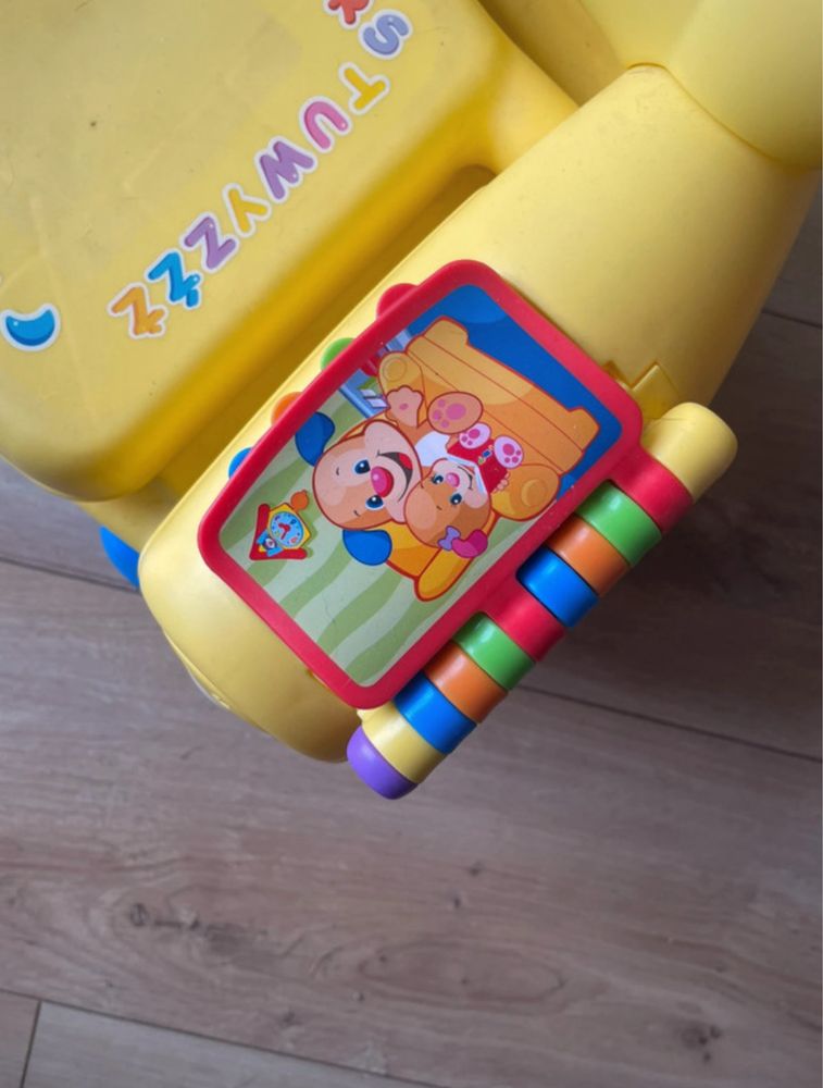 Krzesełko grające Fisher Price