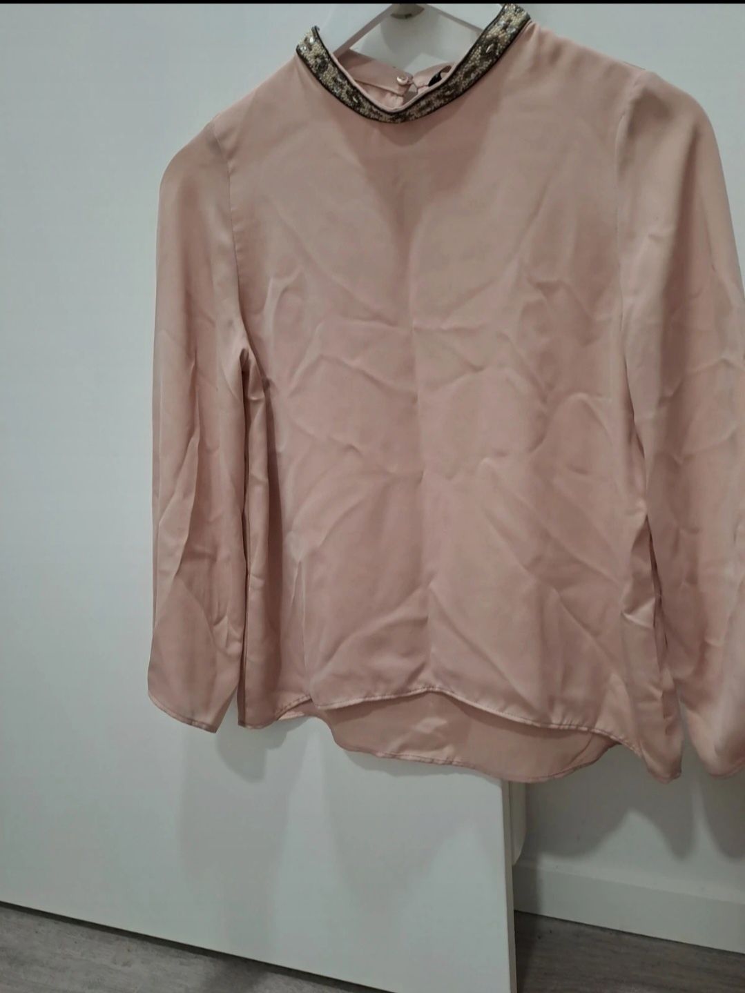 Blusa rosa com detalhe gola