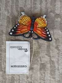 Ozdobny motyl żeliwny