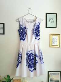 Nowa sukienka na wesele rozkloszowana w fioletowe kwiaty S/M