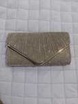 Clutch dourada NOVA
