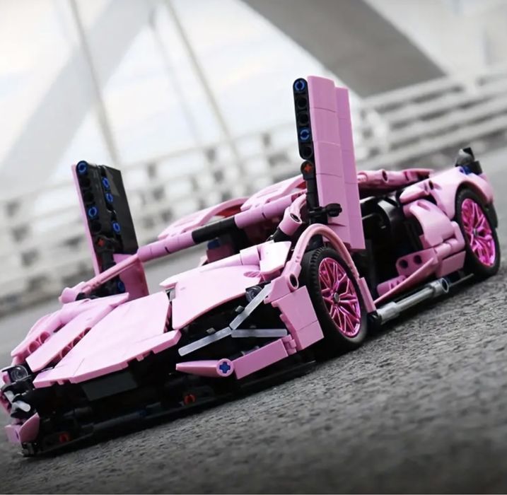 Контсруктор 1300 дет спортивна машина 36*17см lego technic рожева
