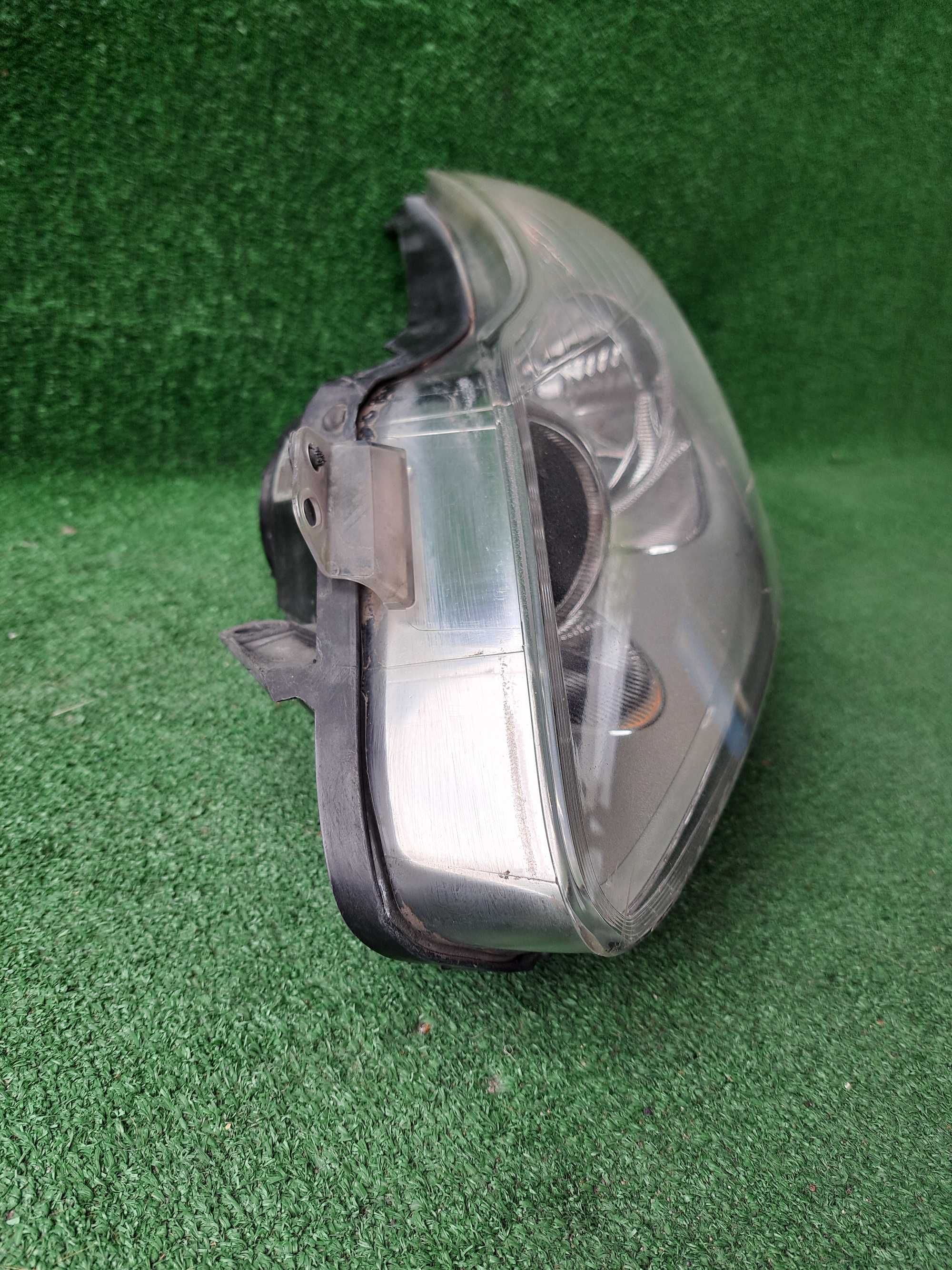 Lampa lewa przednia Opel Corsa D