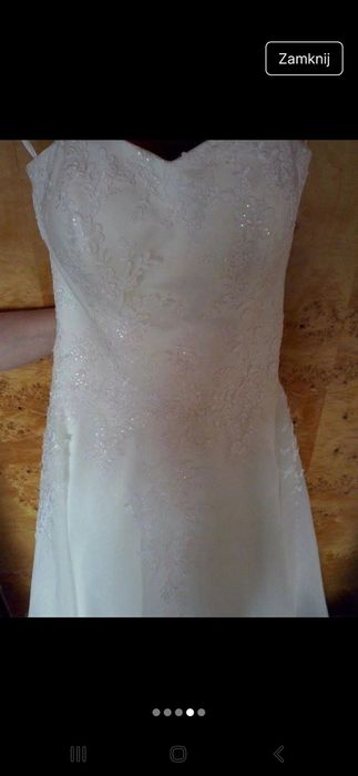 Suknia ślubna z kolekcji Elizabeth Passion, w kolorze ivory