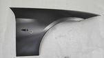 Nowy błotnik prawy BMW E90 04-13 Uszk.