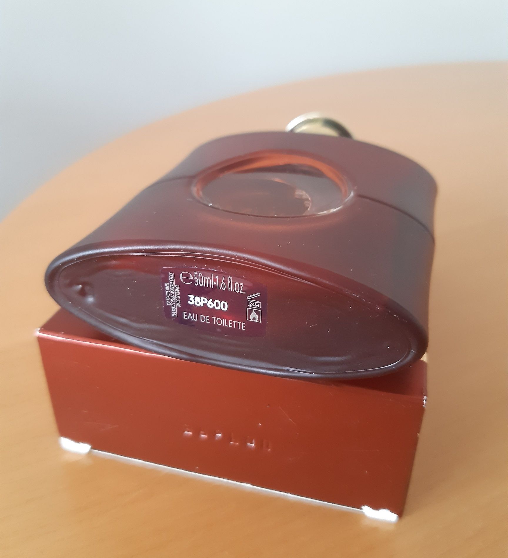 YSL Opium EDT 50 ml z ubytkiem