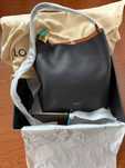 Bolsa de Ombro Hobo LOUIS VUITTON - Modelo Low Key MM