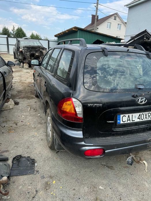 Hyundai Santa Fe 2003 капот крило  Шрот