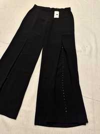 Spodnie damskie czarne r.42 z szerokimi nogawkami