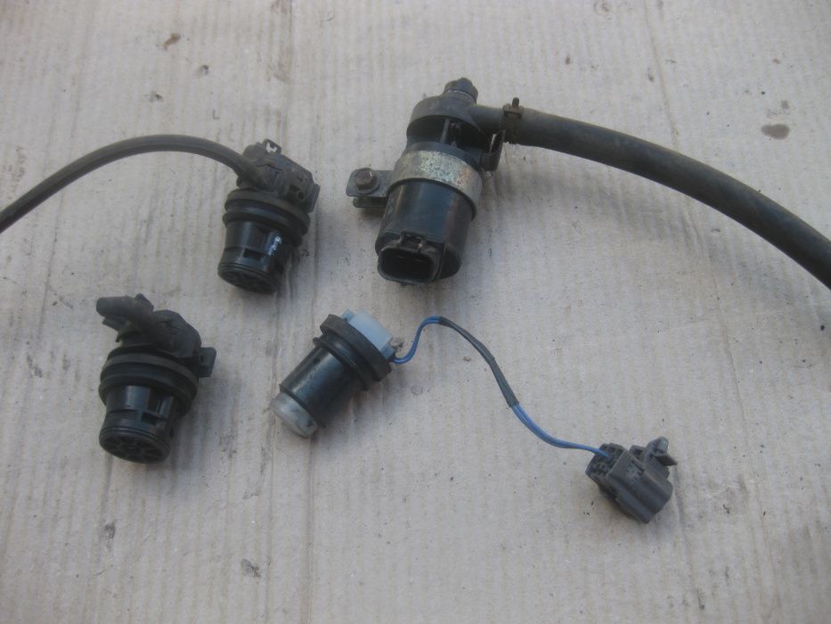 Насос моторчик бачка омывателя имивача фар лобового Мазда Mazda 3 6