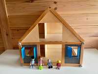 Drewniany domek dla lalek dzień dziecka