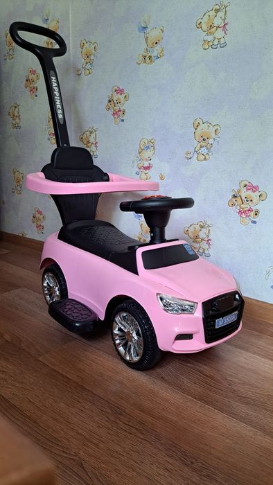 Каталка толокар з батьківською ручкою Bambi 3503A рожевий у відмінному