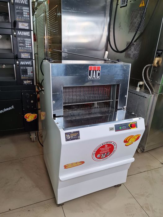 Хлеборезка хлiба и сухарикiв Хліборізка JAC Neu из Германии автомат