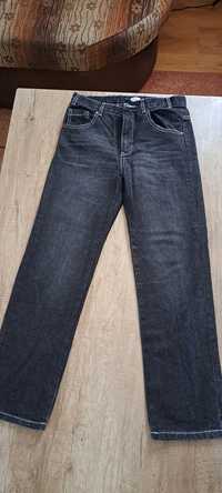 Spodnie jeans 152