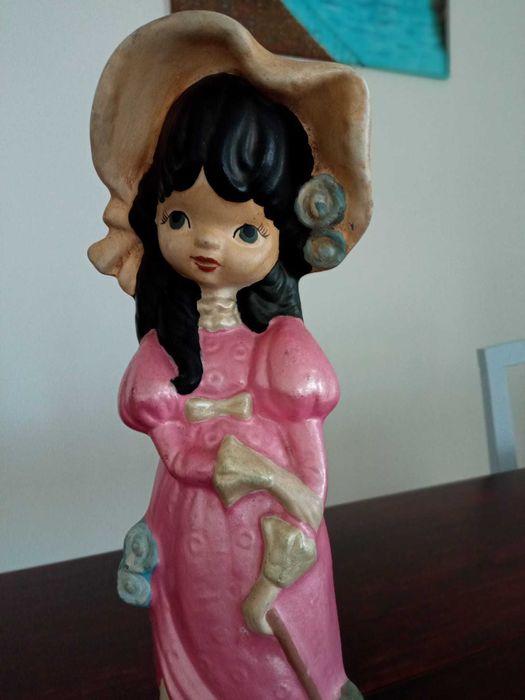 figura de loiça e boneca