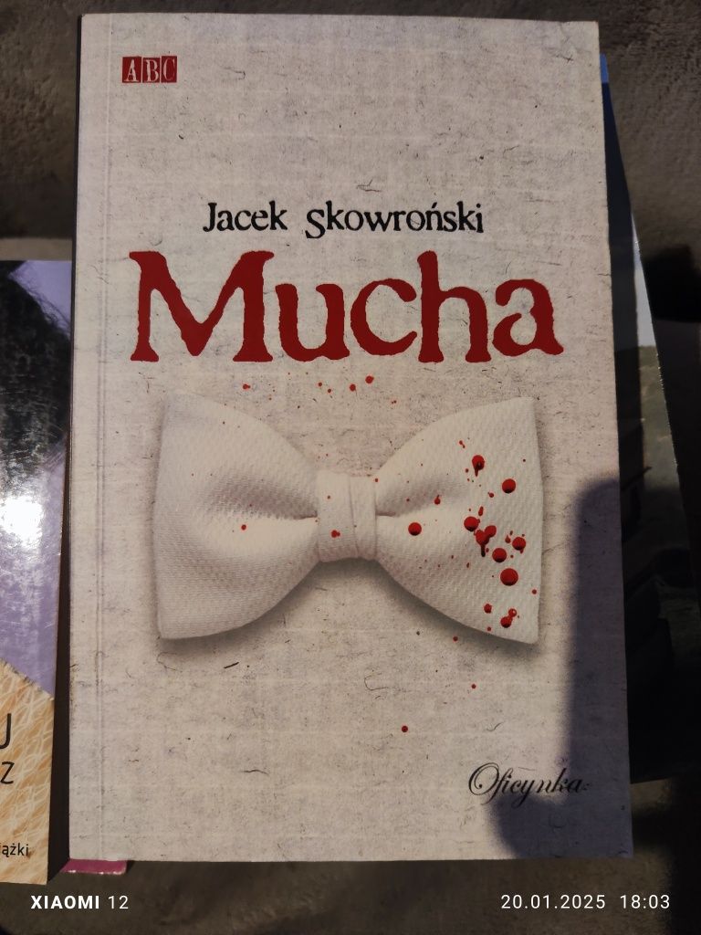 Mucha - Jacek Skowroński
