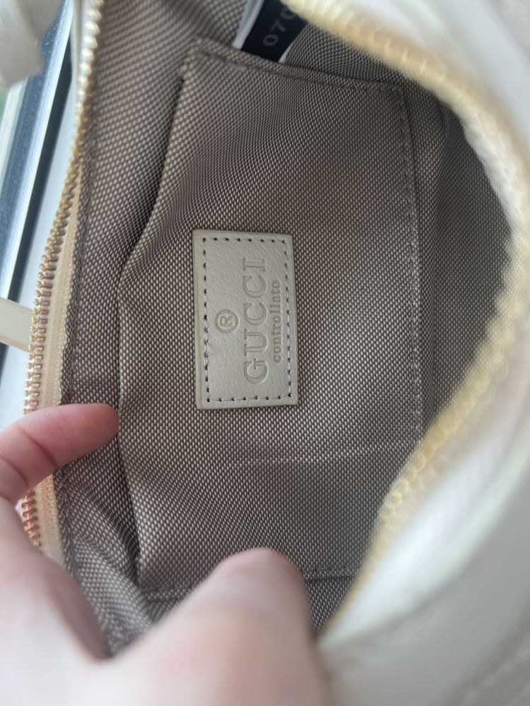 Оригінальні сумочки Adidas і Gucci