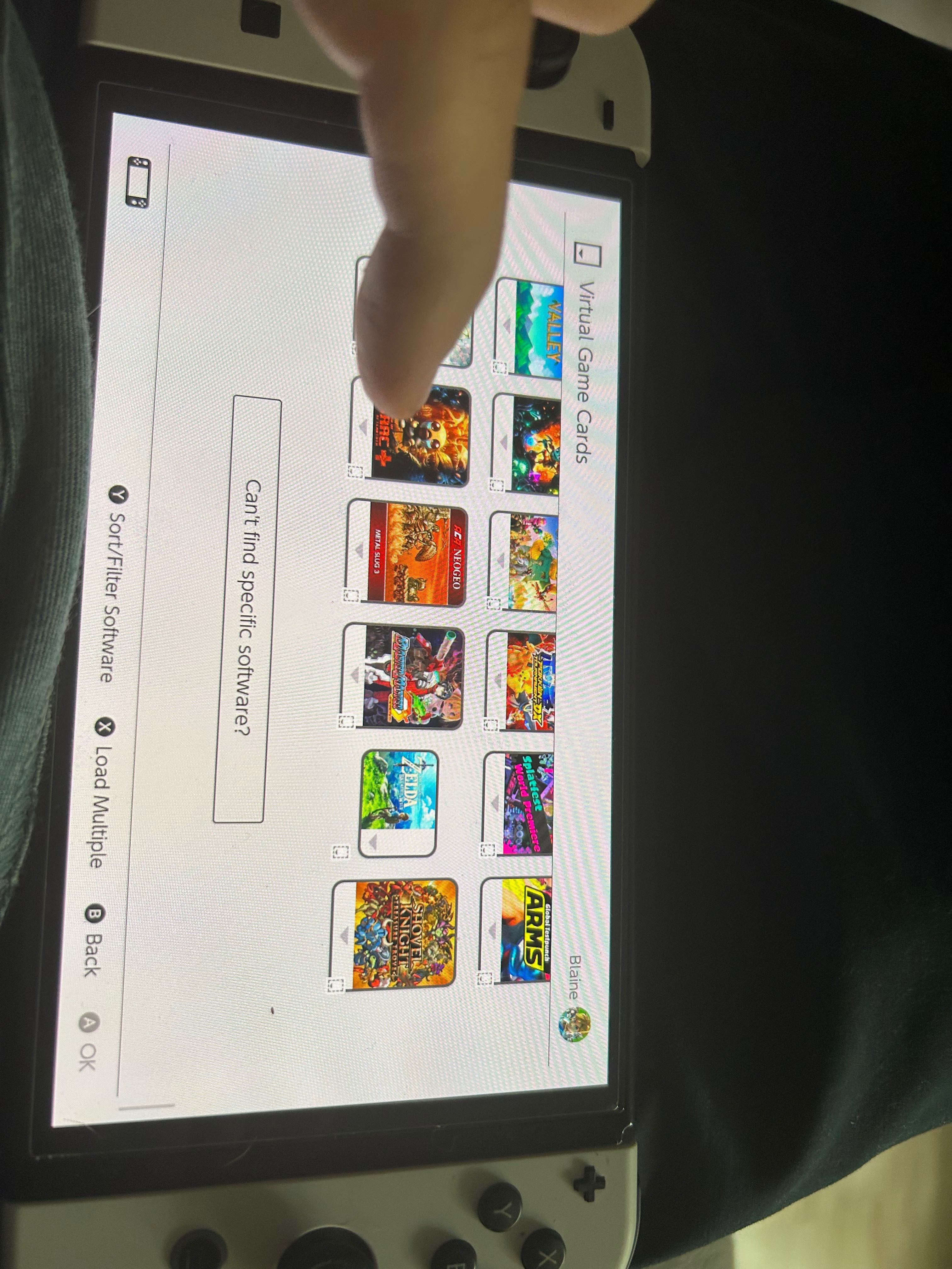 Nintendo Switch OLED + 3 gry w pudełku i 225 gier cyfrowych