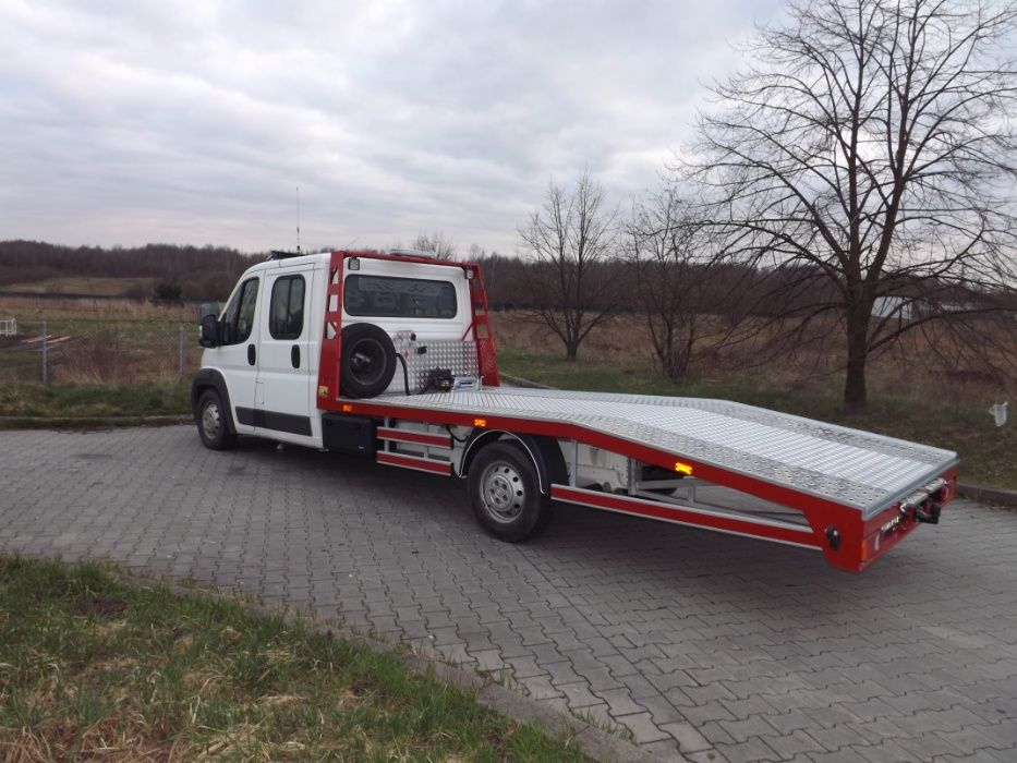 POMOC DROGOWA auto laweta autoholowanie transport aut