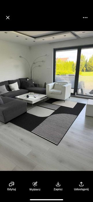 Fotel skórzany Beliani HELSINKI - biały, nowoczesny, podnóżek gratis