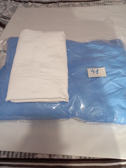 Подушка и простирадло нові