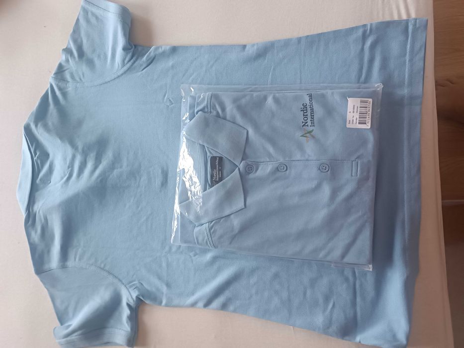 Dwie błękitne nowe polówki