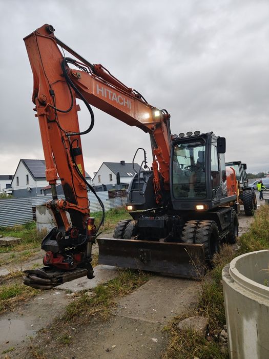 Koparka kołowa Hitachi ZX 140 rototilt kleszcze podpory