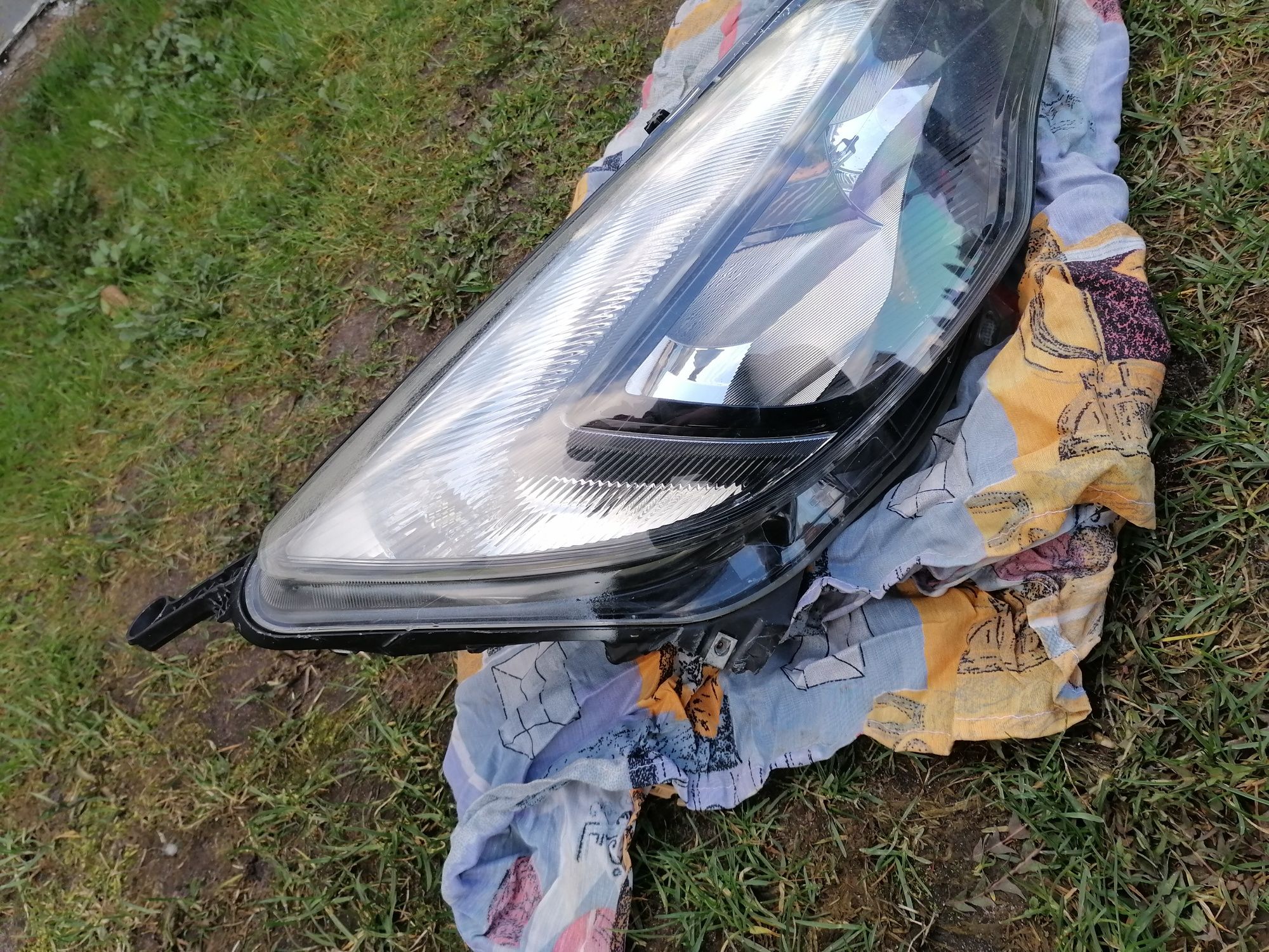 Lampy przód opel astra j