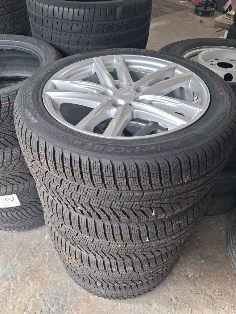 Nowe felgi z nowymi oponami zimowymi  5x112 . 255/45 r18