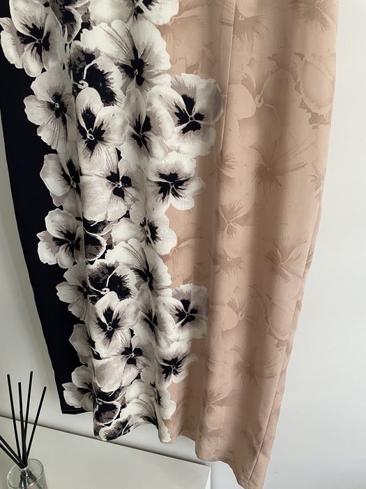 Sukienka w kwiaty elegancka 46 48