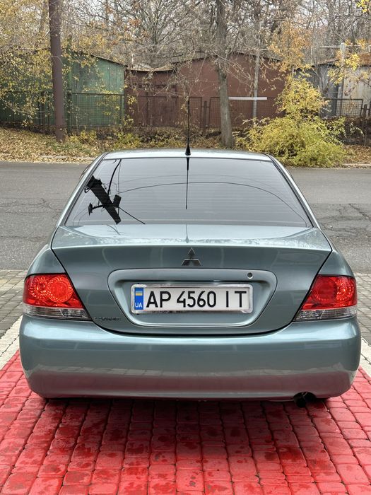 Продам лансер 9 автомат газ/бензин рестайлинг