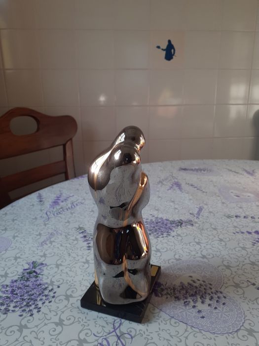 Estatueta de porcelana