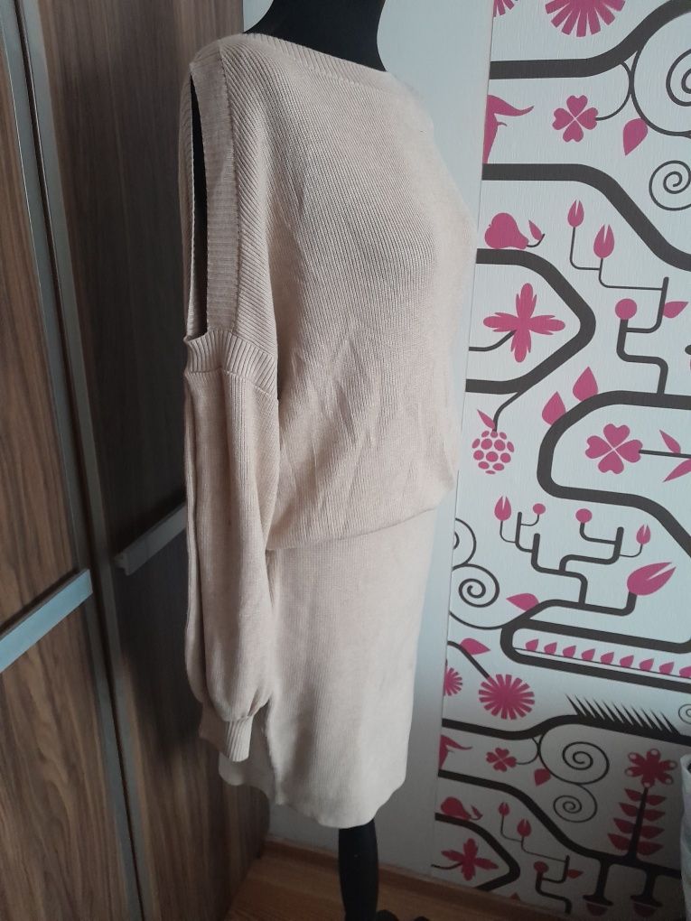 Beżowa sukienka sweterkowa L xL 40 42 bufiaste rękawy rozcięte