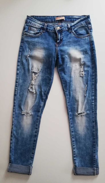 Spodnie dżinsy z dziurami 42/XL