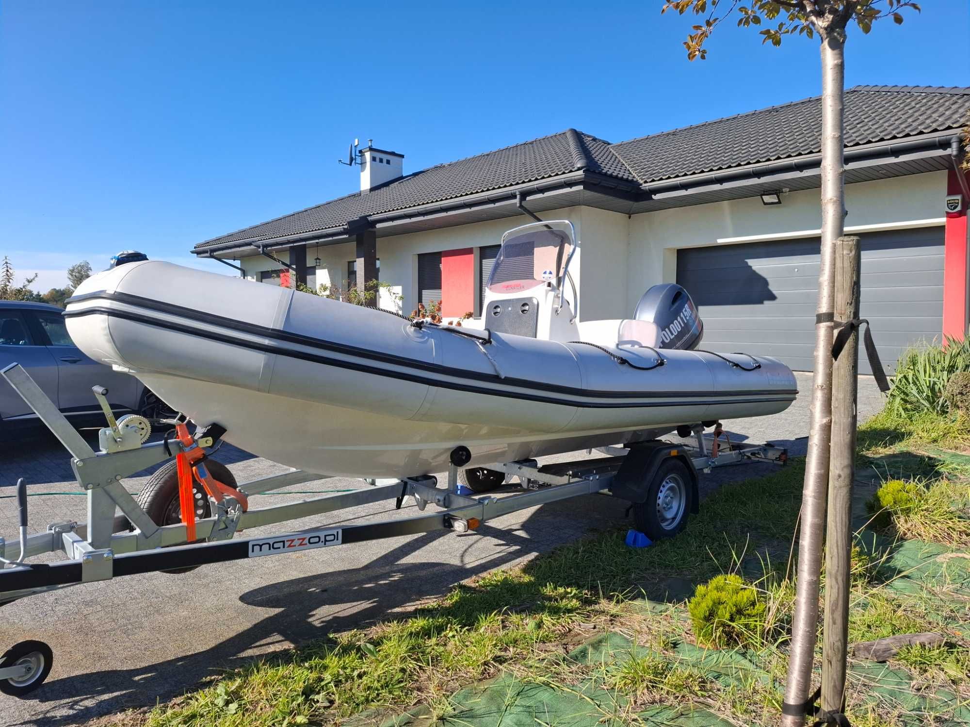 Sprzedam łódz motorową RIB sunrider 550 wraz z przyczepą .