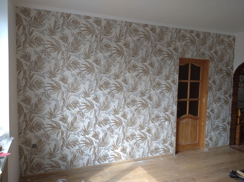 Поклейка  обоев..