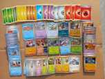 Bulk oryginalnych kart Pokemon (M19) - 200 sztuk + dodatki