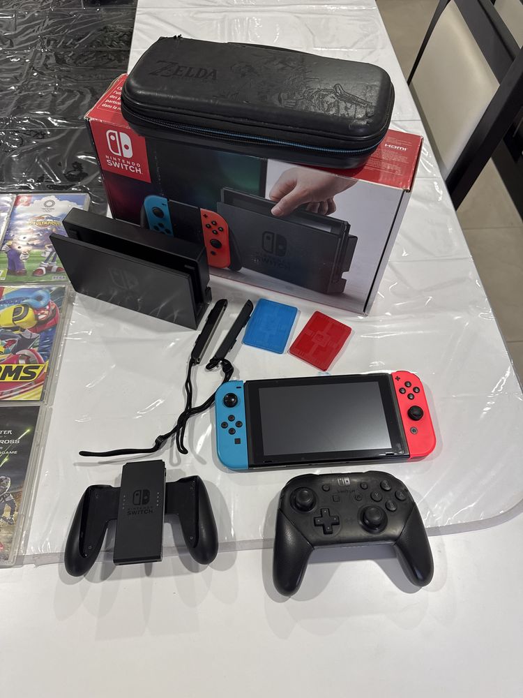 Nintendo Switch com vários jogos,comando Pro e acessórios