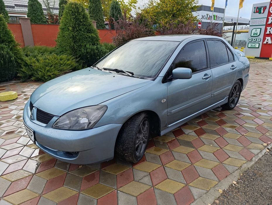 Лансер 9 2.0 газ бензин автомат.