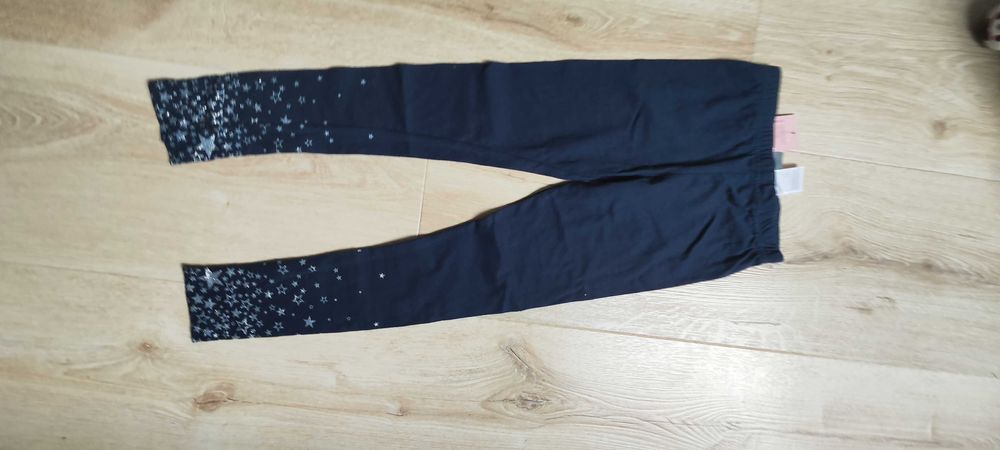 Nowe świąteczne zimowe legginsy gwiazdki brokatowe granatowe 128
