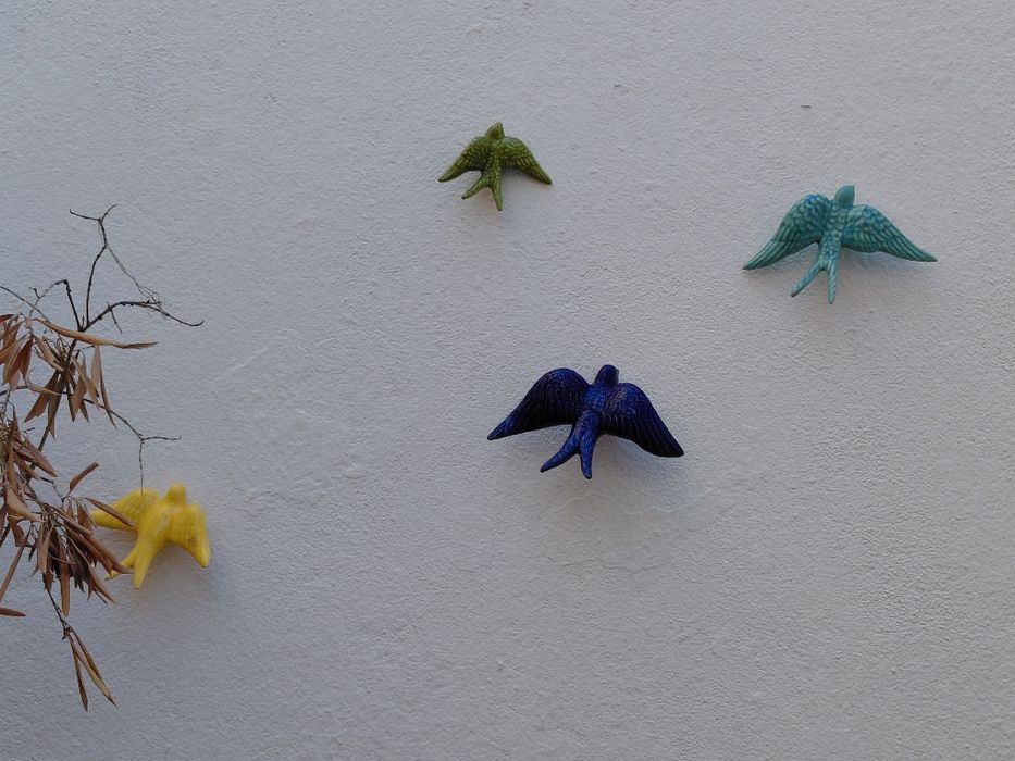 Andorinhas em cerâmica