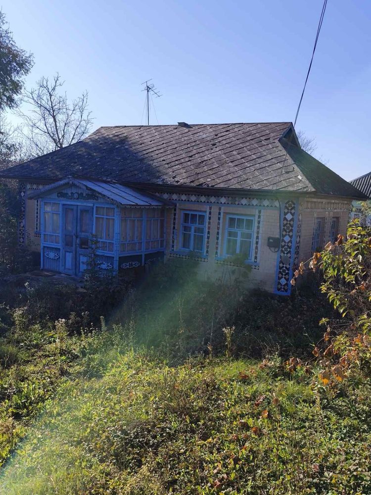 Продається ділянка з будинком