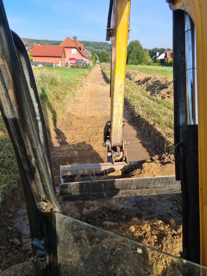 Roboty Ziemne minikoparką fundamenty wykopy  przewóz gruzu ziemi