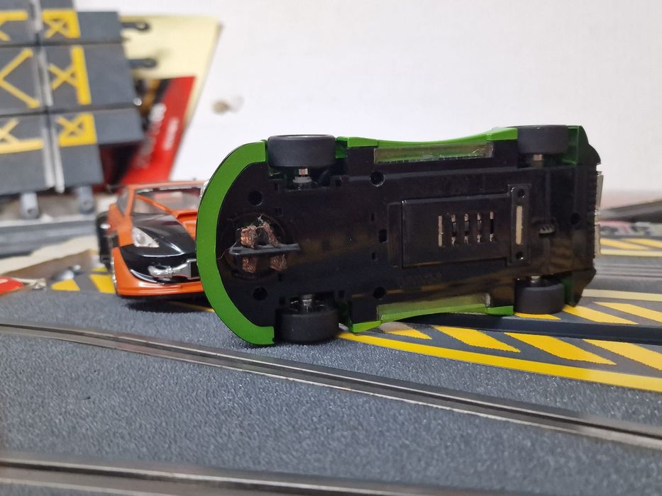 Vendo pista de corrida scx tunning + conjunto de curvas deslizantes
